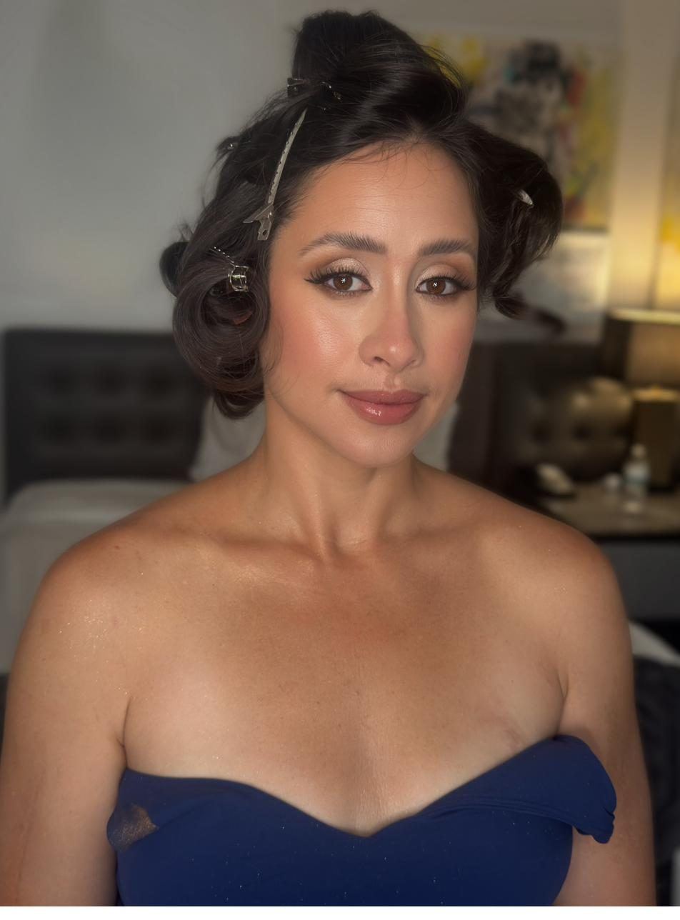 Editorial updo with blue gown