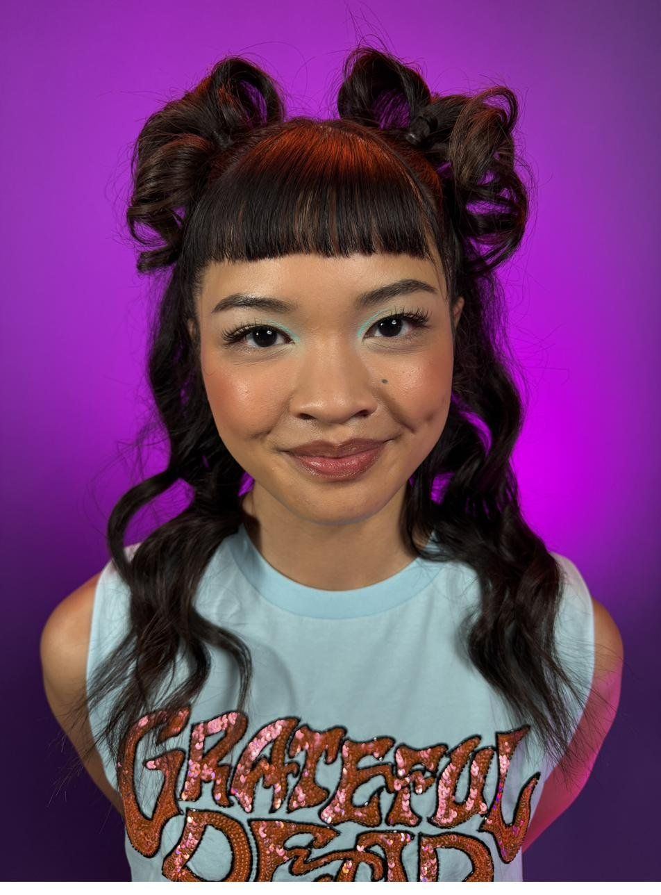 Bold editorial glam with graphic makeup