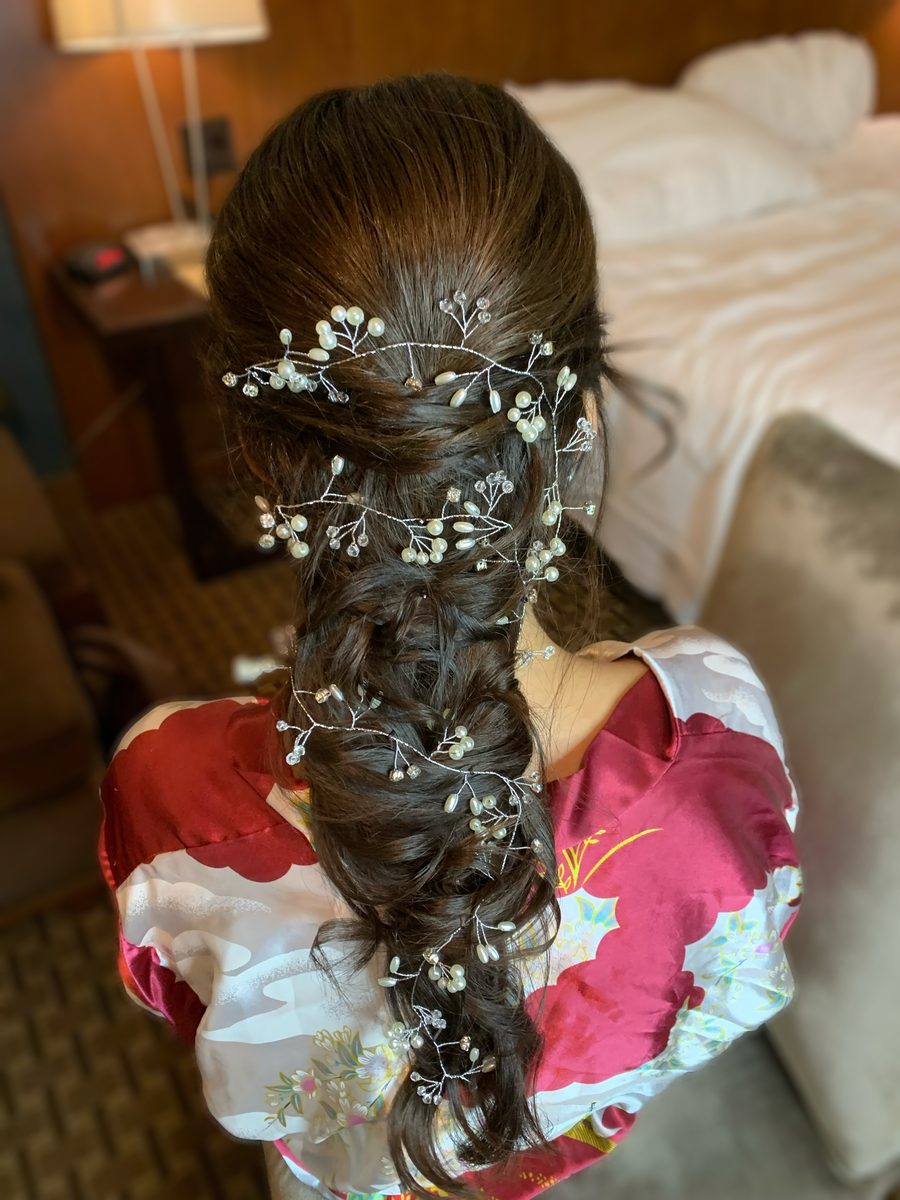 Bridal updo with pearl hair vine