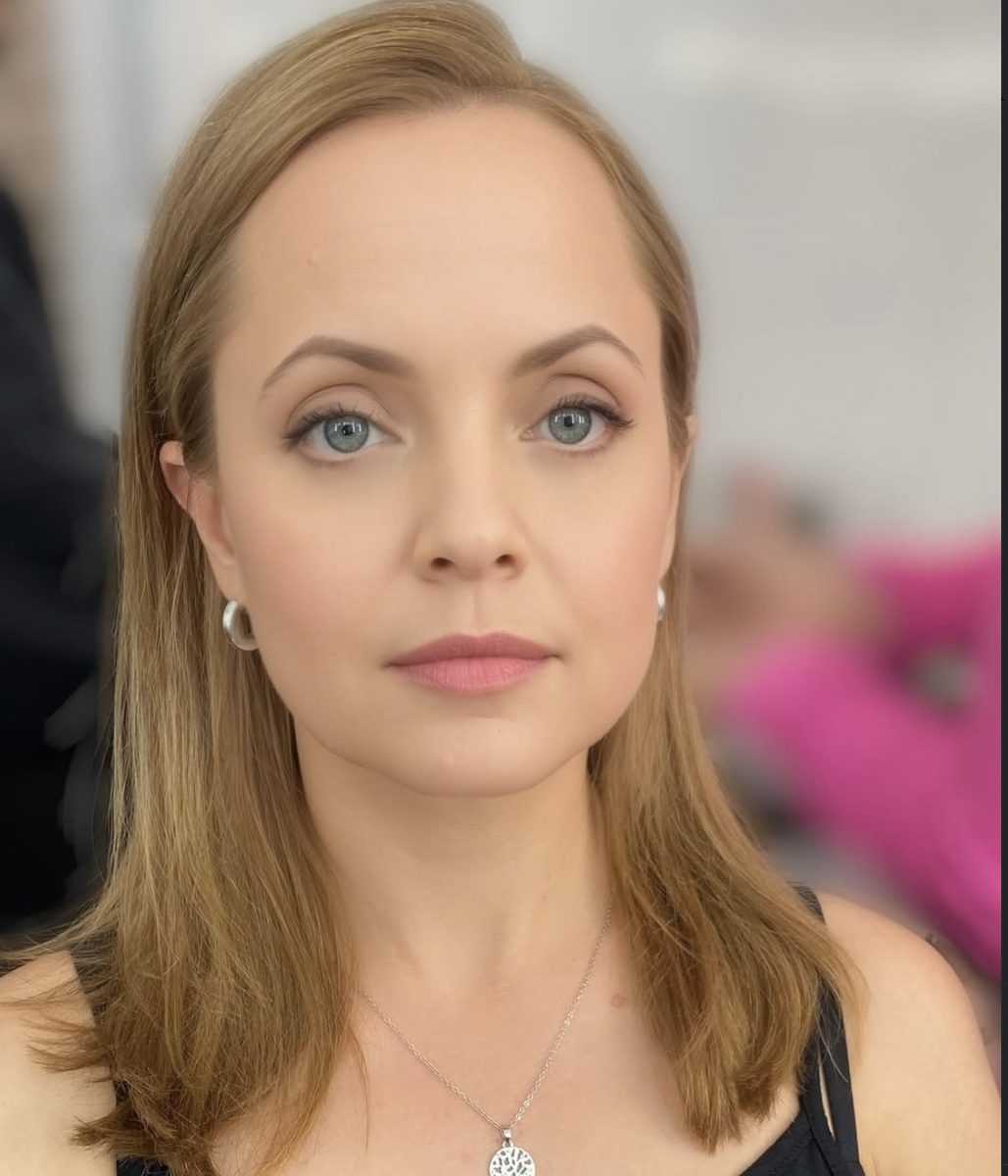 Clean glam portrait with hoop earrings