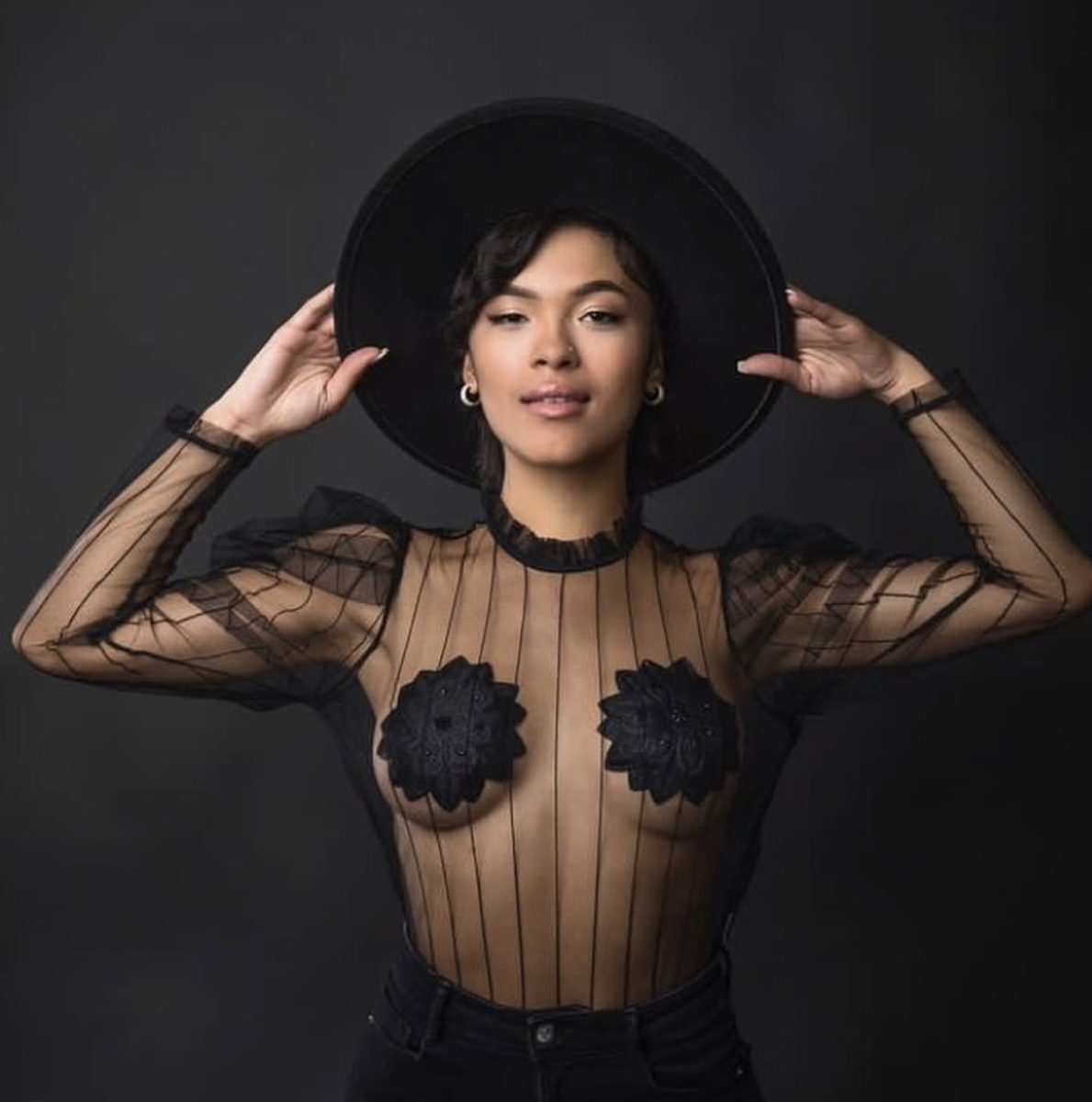 Editorial look with black wide brim hat