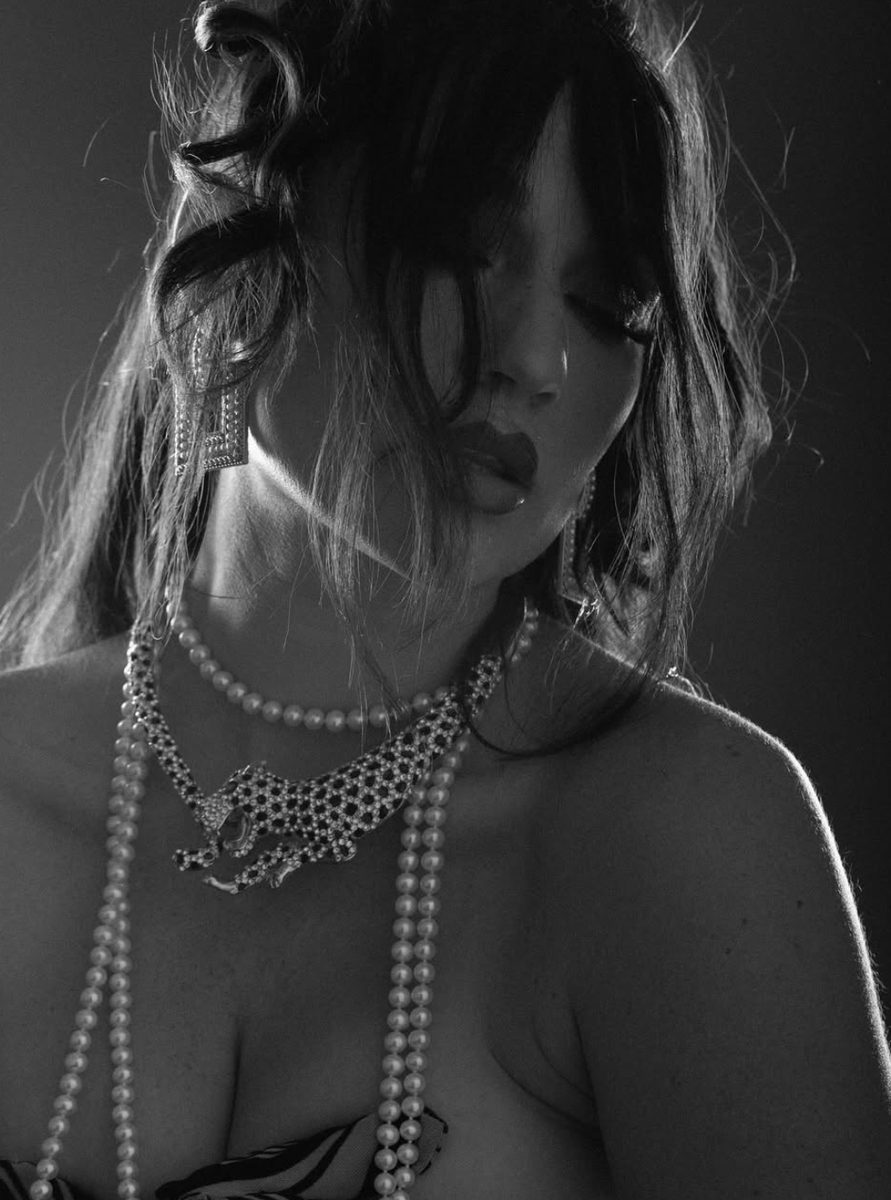 Black and white editorial portrait with pearls