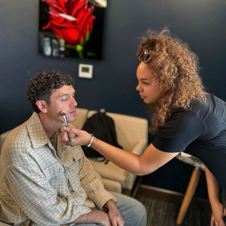 Applying makeup to a client