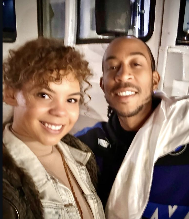 Candid photo with Ludacris on set