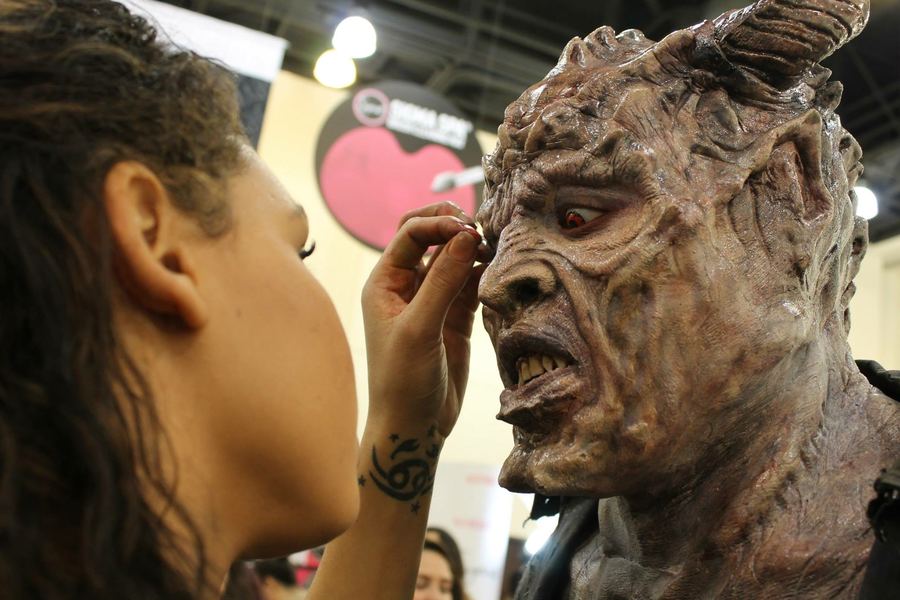 Applying full prosthetic demon character makeup